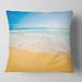 Designart 'Long Waves on Sand under Blue Sky' Seascape Throw Pillow