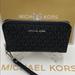 Michael Kors Bags | Michael Kors Jet Set Travel Phone Wallet W | Color: Black/Silver | Size: Large
