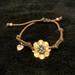 American Eagle Outfitters Jewelry | American Eagle Flower Bracelet | Color: Brown/Gold | Size: Os