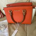 Michael Kors Bags | Leather Michael Kors Hand Bag! | Color: Orange/White | Size: Os