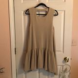 Free People Dresses | Free People Dropwaist Tan Sleeveless Ruffle Dress | Color: Cream | Size: Xs