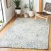Blue/White 60 x 0.47 in Indoor Area Rug - George Oliver Gladies Geometric Handmade Tufted Ivory/Blue Area Rug Polyester | 60 W x 0.47 D in | Wayfair