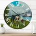 Designart 'F A Black and A Spotted Cow In Front Of A Lake' Farmhouse wall clock