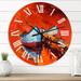 Designart 'Boats Resting On The Water Near Coastal Town IV' Nautical & Coastal wall clock