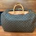 Louis Vuitton Bags | Louis Vuitton Alize 2 Poches Travel Bag | Color: Brown | Size: Os