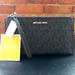 Michael Kors Bags | Michael Kors Jet Set Large Black Zip Clutch | Color: Black/Silver | Size: Os