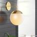 Wade Logan® Exira 1 - Light Dimmable Armed Sconce Glass/Metal in Yellow | 14 H x 7.25 W x 10.25 D in | Wayfair 1DA15733B81F46F3A468D6549BB9E1A0