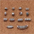 Perles d'espacement de tube sculptées en argent tibétain perles d'espacement à grand trou