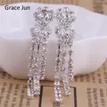 Grace Jaguar-Boucles d'oreilles à clip avec pompon en cristal biscuits boucles d'oreilles non