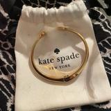 Kate Spade Accessories | Kate Spade Gold Bracelet. Never Worn. | Color: Gold/White | Size: Os