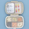 Organisateur de comprimés à 8 grilles boîte à pilules de voyage avec anneau scellé petite boîte à