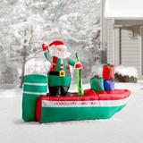 The Holiday Aisle® Christmas Santa Claus Fishing Inflatable Polyester in Green/Red | 67 H x 35 W x 95 D in | Wayfair