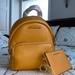 Michael Kors Bags | Mustard Yellow Convertible Michael Kors Backpack | Color: Orange/Yellow | Size: Adjustable Straps