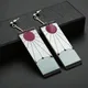 Boucles d'oreilles Demon Slayer Kimetsu No Yaiba lame de fantôme pour femmes hommes Anime amoureux