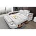 Hariana Tech Smart Ultimate Italian Leather Tufted Low Profile Storage Platform Bed Wood & /Upholstered/Metal | 35 H x 78 W x 102 D in | Wayfair