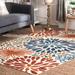 Blue/Orange 60 x 0.2 in Area Rug - World Menagerie Weyland Floral Power Loom Indoor/Outdoor Patio Rug | 60 W x 0.2 D in | Wayfair