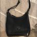 Dooney & Bourke Bags | Authentic Solid Black Dooney And Burke Purse | Color: Black | Size: 9 Inches Tall And 11 Inches Wide