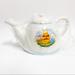 Disney Kitchen | New Disney Pooh Easter Teapot Centerpiece | Color: White/Cream | Size: Os