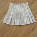 Brandy Melville Skirts | Brandy Melville Tennis Skirt | Color: White/Silver | Size: 2