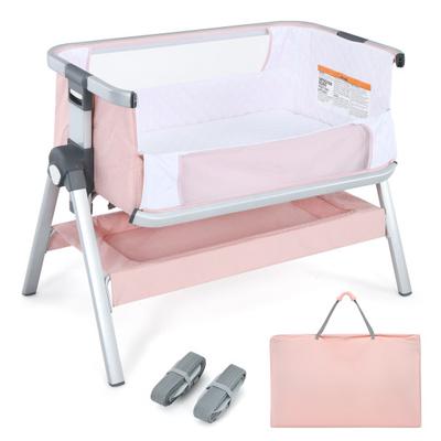 Costway Baby Bassinet Bedside Sleeper with Storage Basket and Wheel for Newborn-Pink