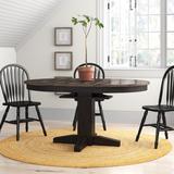 Three Posts™ Athey Butterfly Leaf Solid Wood Pedestal Dining Table Wood in Black/Brown | 30 H in | Wayfair FEA9C55ED83A4146AE54DF38846FE4B7