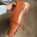 Nike Shoes | Air Max 97 Nikes! Worn 2-3 Times Women’s 10.5 | Color: Orange/White | Size: 10.5