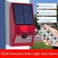 Détecteur de mouvement solaire 2 en 1 alarme lumineuse sirène télécommandée lampe étanche maison