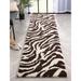 Brown 118 x 31 x 1 in Indoor Area Rug - Well Woven Dondre Animal Print Black/Off White Area Rug Polypropylene | 118 H x 31 W x 1 D in | Wayfair