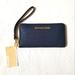 Michael Kors Bags | *New* Michael Kors Navy Blue Jet Set Travel Bag Phone/Money/Passport/Card Case | Color: Blue | Size: Os