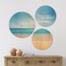 East Urban Home Designart 'Wide Blue Sky Over Beach' Seashore Wood Wall Art Set Of 3 Circles Wood in Blue/Brown | 34 H x 44 W x 1 D in | Wayfair