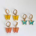 Brandy Melville Jewelry | Butterfly Huggie Hoops Earrings | Color: Blue/Yellow | Size: Os