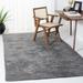 SAFAVIEH Faux Sheep Skin Llinos 2.4-inch Thick Rug