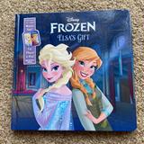 Disney Toys | Disney Frozen Elsa’s Gift Hardcover Board Book Includes Mobile App | Color: Cream/Tan | Size: Os