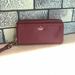 Kate Spade Bags | Burgundy Kate Spade Wristlet | Color: Brown | Size: 8 Inch Wide, 4 1/2 Inch Tall, 1 1/2 Inch Thick