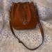 Dooney & Bourke Bags | Dooney & Bourke All Leather Crossbody Bucket Bag Cameral Color | Color: Brown | Size: Os