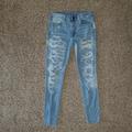 American Eagle Outfitters Jeans | American Eagle Outfitters Denim Super Stretch Distressed High Rise Jegging Jeans | Color: Blue | Size: 6