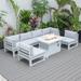 LeisureMod Chelsea 7-Piece Patio Sectional And Fire Pit Table White Aluminum With Cushions in Light Grey - LeisureMod CSFW-7LGR