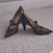 Nine West Shoes | Cute Pair Of Nine West Pumps With A Buckle Strap.. | Color: Brown | Size: 8.5