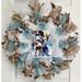 The Holiday Aisle® Winter Wreath Cuddling Snowman Burlap/Deco Mesh in Blue/Brown/White | 24 H x 24 W x 6 D in | Wayfair