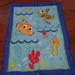 Disney Accessories | Disney Nemo Wavy Days Baby Quilted Blanket 31x40 In | Color: Blue/Orange | Size: Osbb