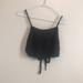 Brandy Melville Tops | Brandy Melville Thin Black Spaghetti Strap Tie Back Crop Top One Size | Color: Black | Size: One Size