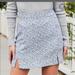 Brandy Melville Skirts | Brandy Melville Cara Floral Mini Skirt | Color: White/Silver | Size: One Size