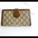 Gucci Bags | Gucci Vintage Gg Link Monogram Brown/Tan Long Wallet Gg Logo Closure | Color: Brown | Size: Os