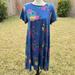 Lularoe Dresses | Lularoe Carly Dress Womens Size Small S Flower Designs On Purple Short Sleeve | Color: Blue/Pink | Size: S