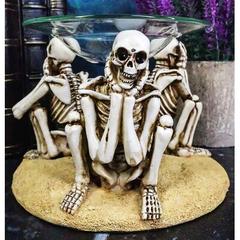 The Holiday Aisle® Beadie Ebros Skeletons Candle Heat Oil Burner Tart Warmer Aroma Scent Figurine Resin, in Brown/White | Wayfair