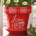 Personalization Mall Love Grows Here Personalized Purple Flower Pot Planter Ceramic/Stone in Red | 5.25 H x 5.25 W x 5 D in | Wayfair 15622-R