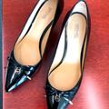 Michael Kors Shoes | Like New Michael Kors Kitten Heels Black Pumps With A Gold Mk-Tassel. | Color: Black | Size: 8
