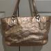 Coach Bags | Coach Gold Gallery Embossed Metallic Leather Tote Bag F17730 | Color: Gold | Size: Os