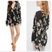 Free People Tops | Free People Tuscan Dreams Floral Printed Long Sleeve Tunic Top | Color: Black/White | Size: S