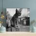 Red Barrel Studio® scale Photo Of A Cat Sitting On A Pole By The Street - 1 Piece Square Graphic Art Print On Wrapped Canvas in Gray | Wayfair